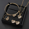 Gold jewellery set with earrings, pendant and adjustable bracelet showing love, water drop and bell motifs