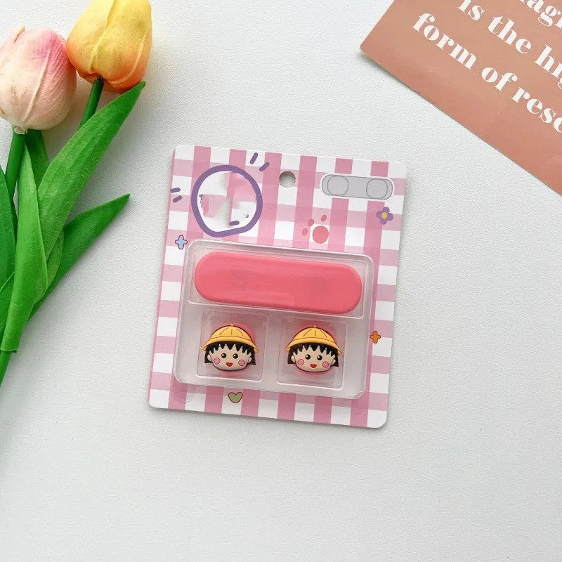 Colourful cartoon-style plastic fixer for organising a magnetic data cable on a desktop