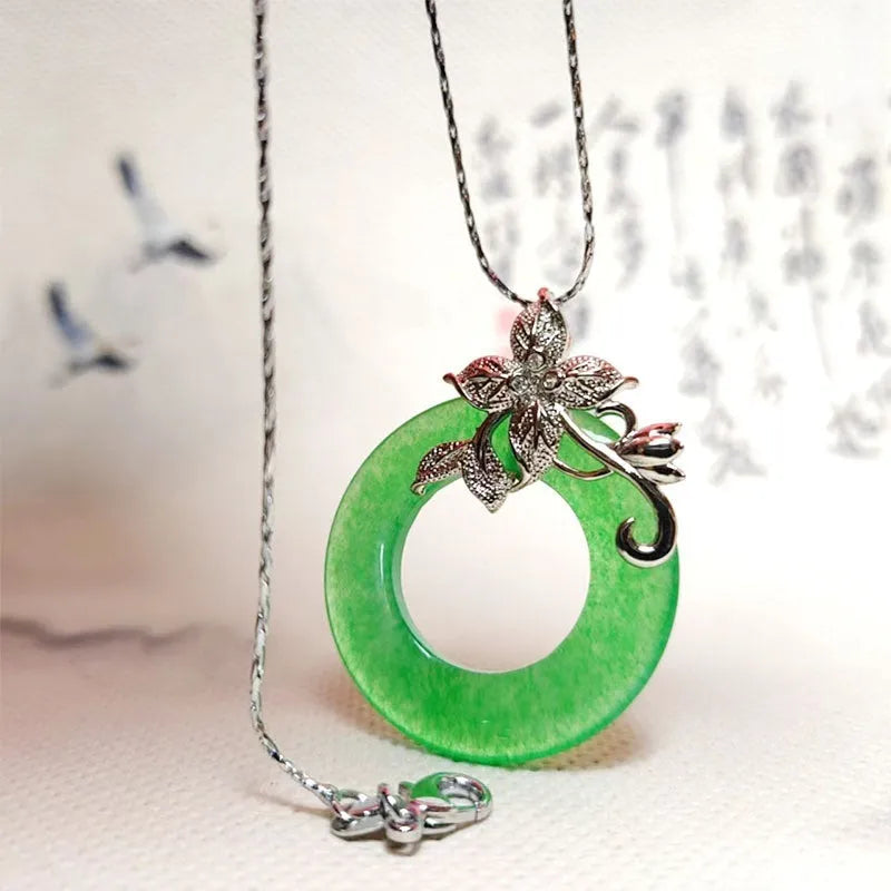 Quartz rock jade pendant necklace with emerald inlay on gold chain
