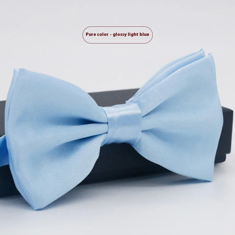 Men's flat head solid colour bow tie in polyester, showing 12cm by 6cm size on a background.