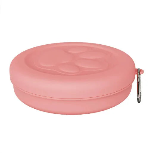 Portable dog food bowl with snack box compartment in light pink and light green colours