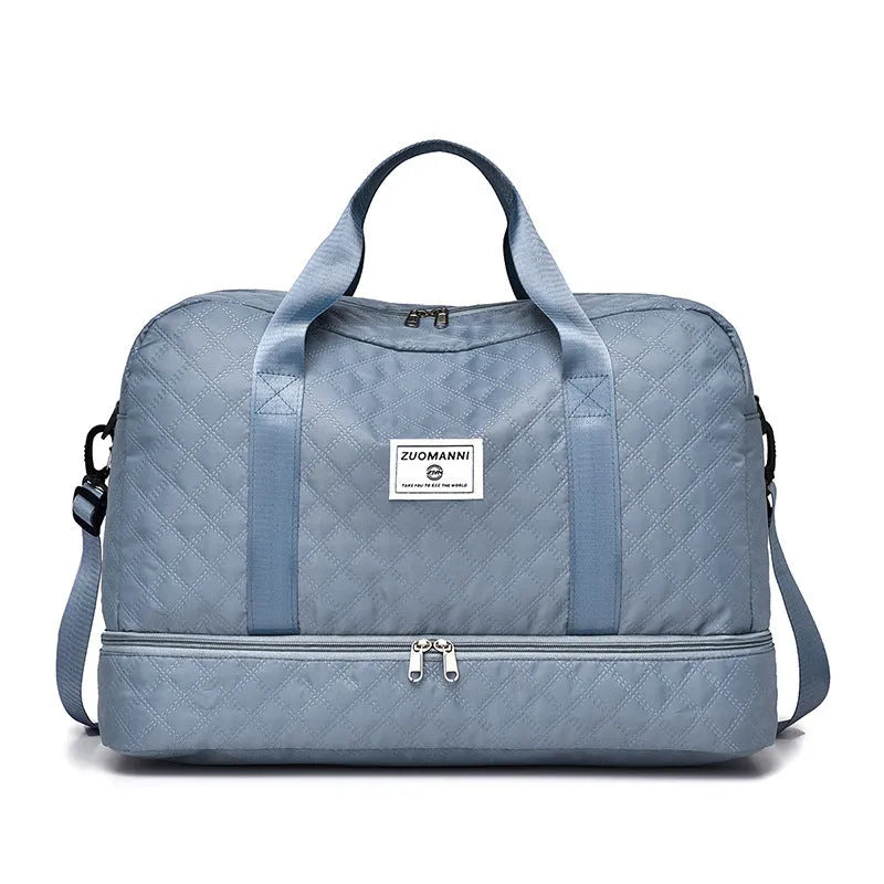 Large Oxford cloth leisure travel bag in a solid colour with sewing thread detail, shown in a 36-55L capacity size.