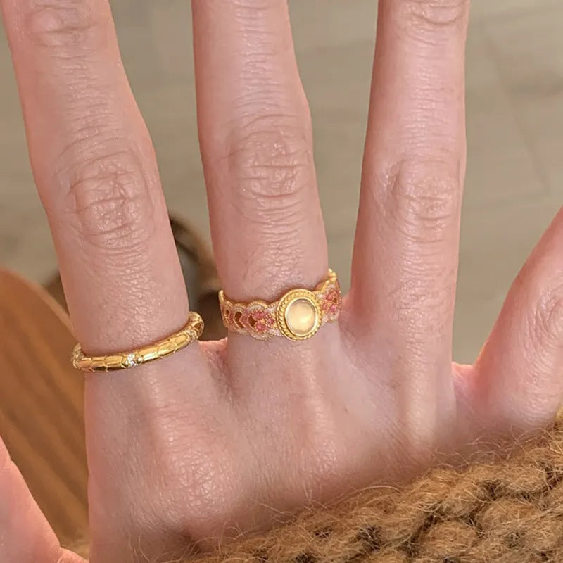 Pink crystal enamel open ring with geometric shape and gold plating on copper
