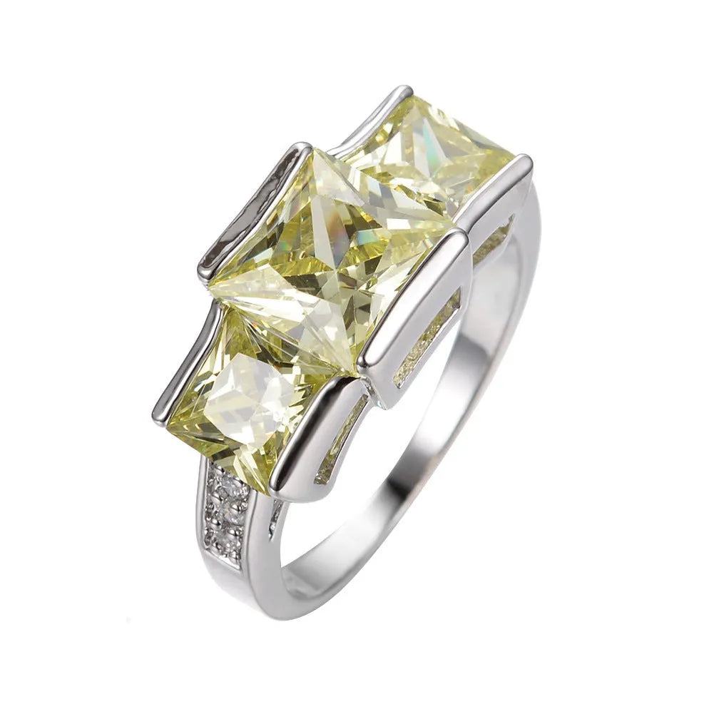Copper electroplated colourful ring ornament in geometric design showing multiple colour options