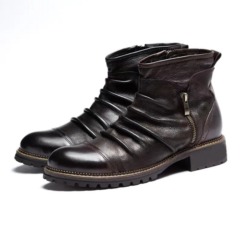 Black and brown mid-calf cowboy boots with a side zipper, round toe, and horseshoe heel