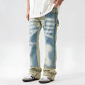 Retro yellow and blue patchwork jeans with splash-ink damaged design on polyester denim fabric
