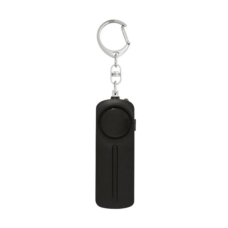 Girls personal safety alarm with keychain attachment in various colours showing compact dimensions