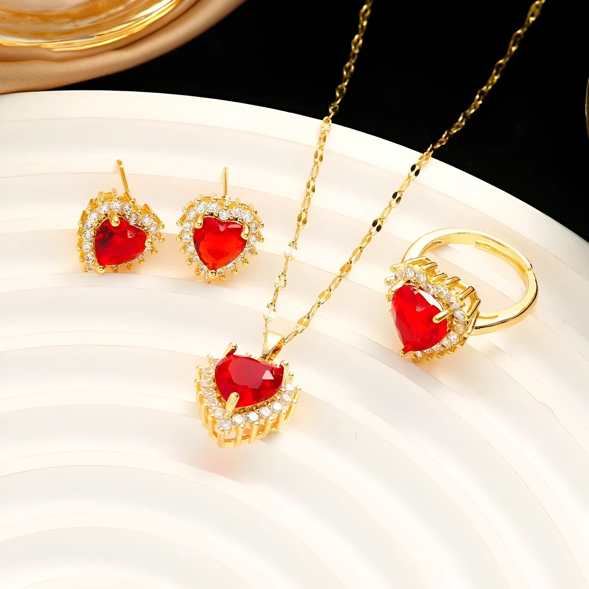 Gold red heart jewellery suit with mixed gem inlays on titanium steel necklace, earrings and ring
