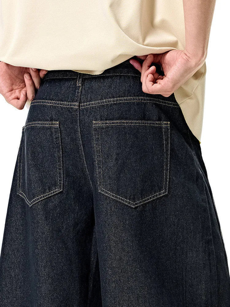 Men's wide leg denim trousers in original cow colour showing full length and relaxed fit