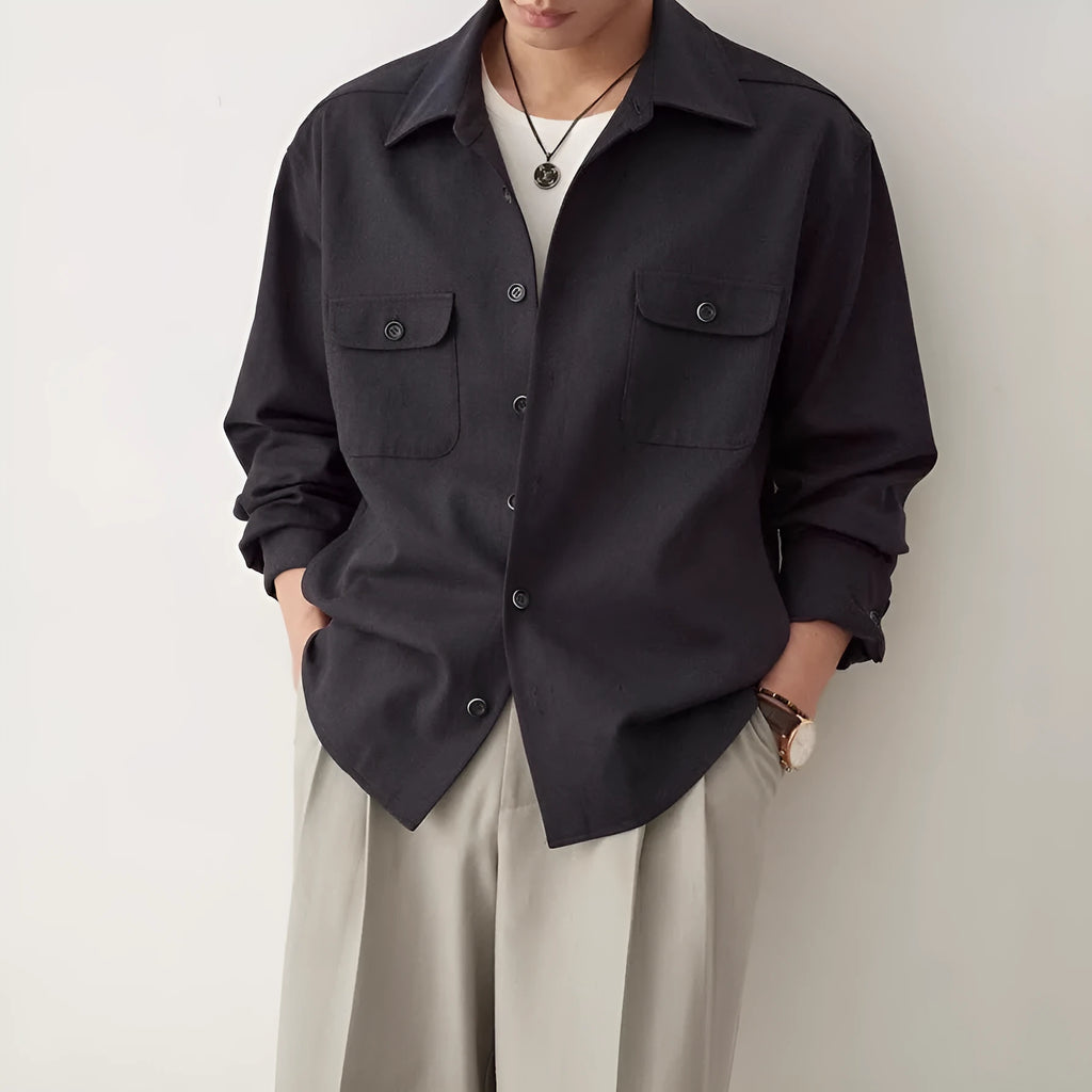 Men's light sand rice colour casual long sleeve shirt with a simple lapel, on a hanger.