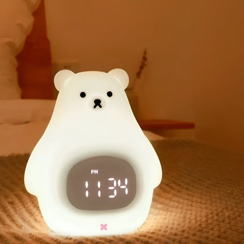 White silicone night light shaped as a cartoon bear with multi-colour LED illumination
