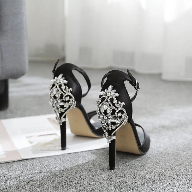 Black suede women's high heel shoes with rhinestone detailing and fish mouth toe