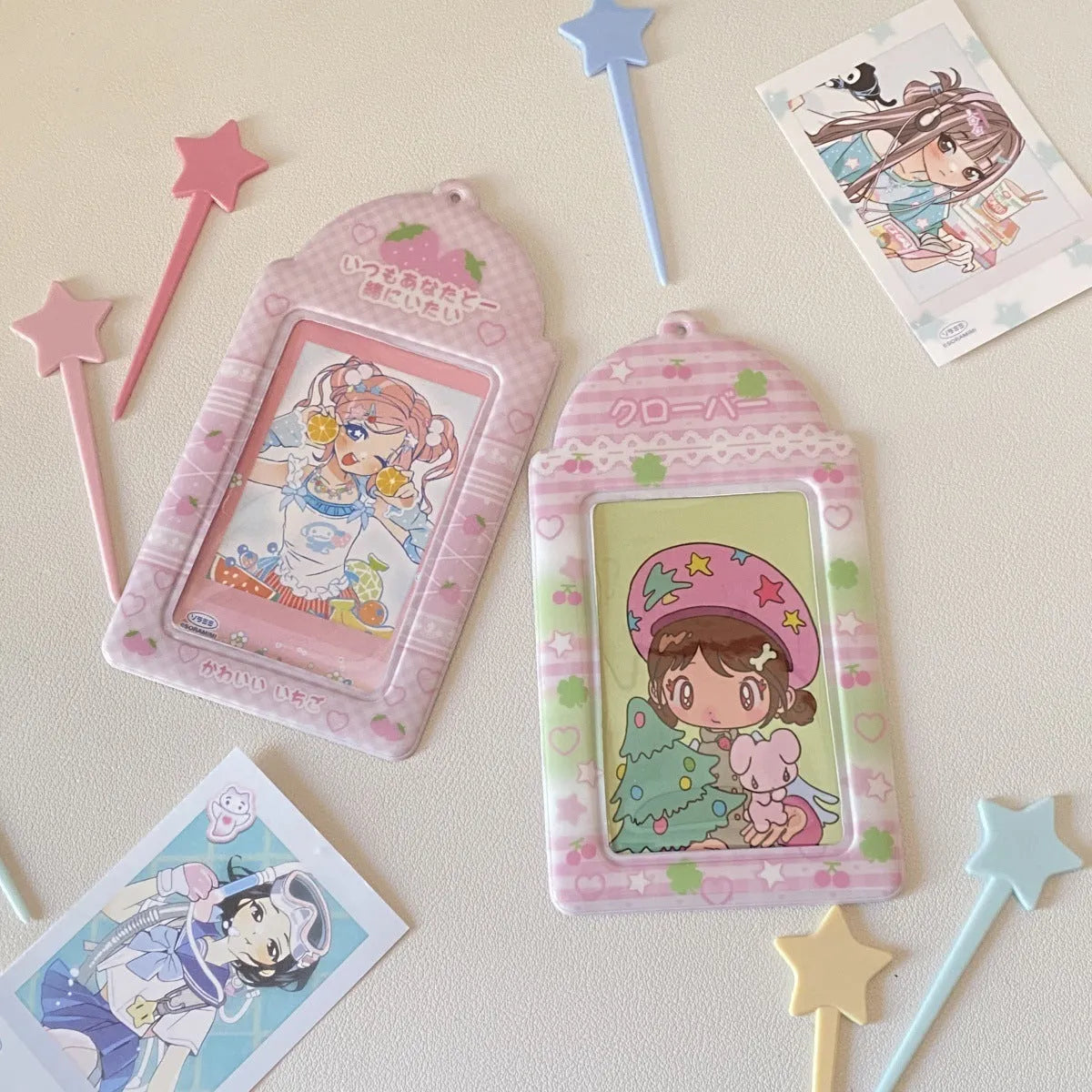 Cartoon strawberry and four-leaf clover PVC card holder pendants for ID and meal cards.