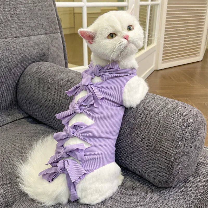 Lace-up polyester cat sterilisation recovery garment shown in blue, brown, green pineapple, pink, or purple