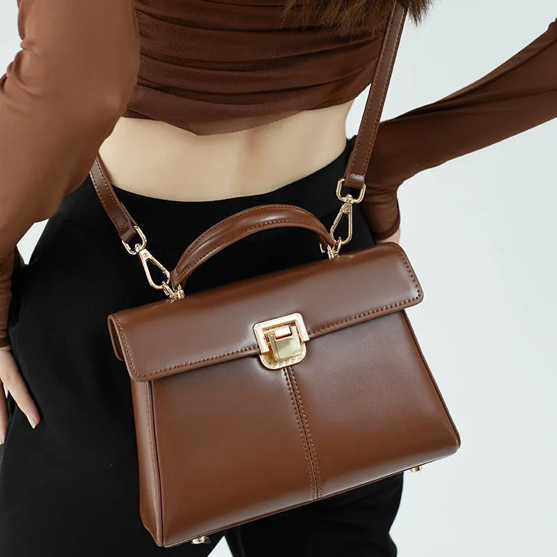 Women's black genuine leather shoulder bag with vachette clasp in horizontal square shape
