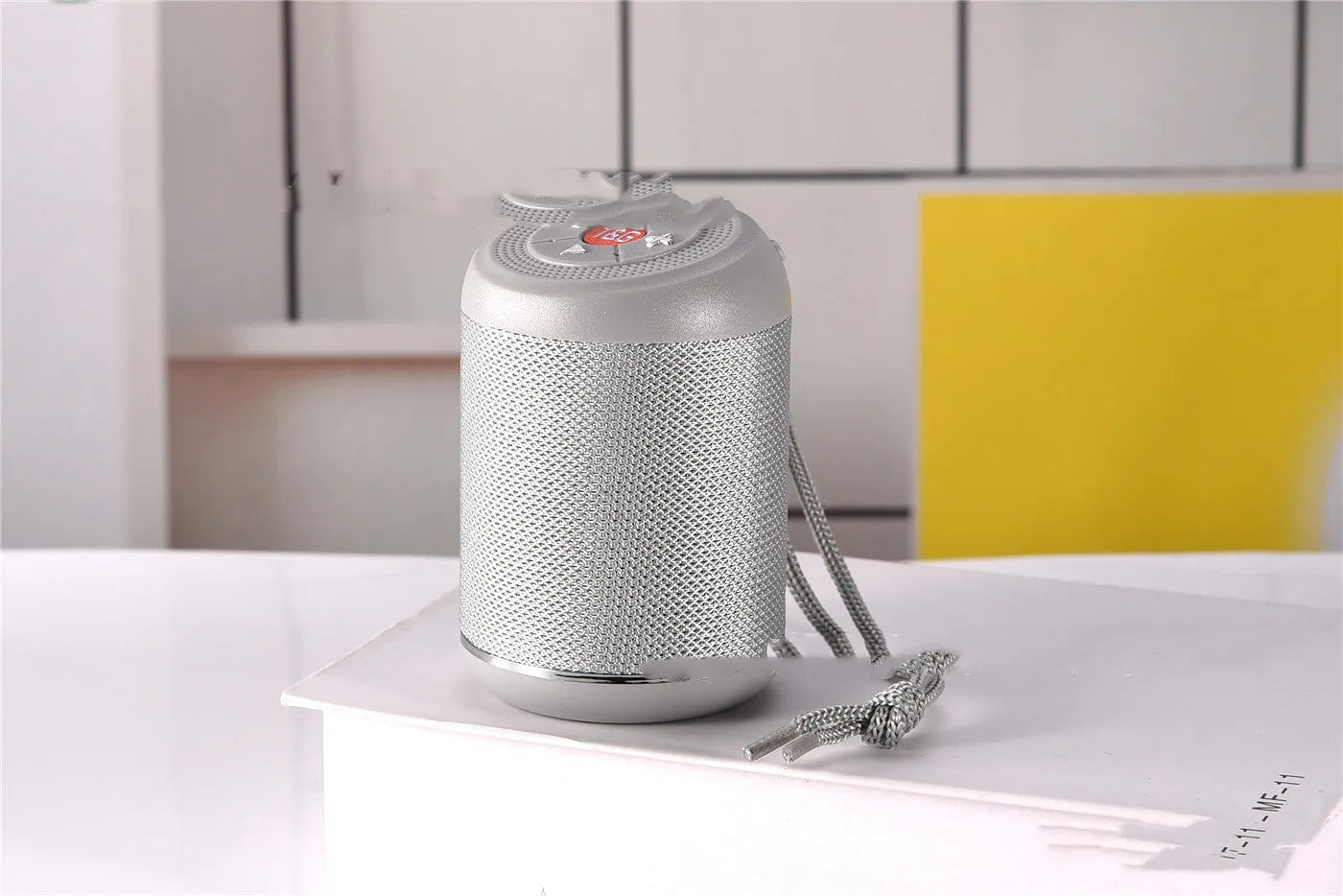 Portable outdoor Bluetooth subwoofer speaker in multiple colour options including black, blue, and camouflage.
