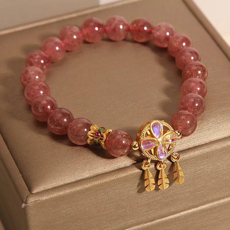 Women's strawberry quartz crystal bracelet with four-leaf clover dream catcher pendant