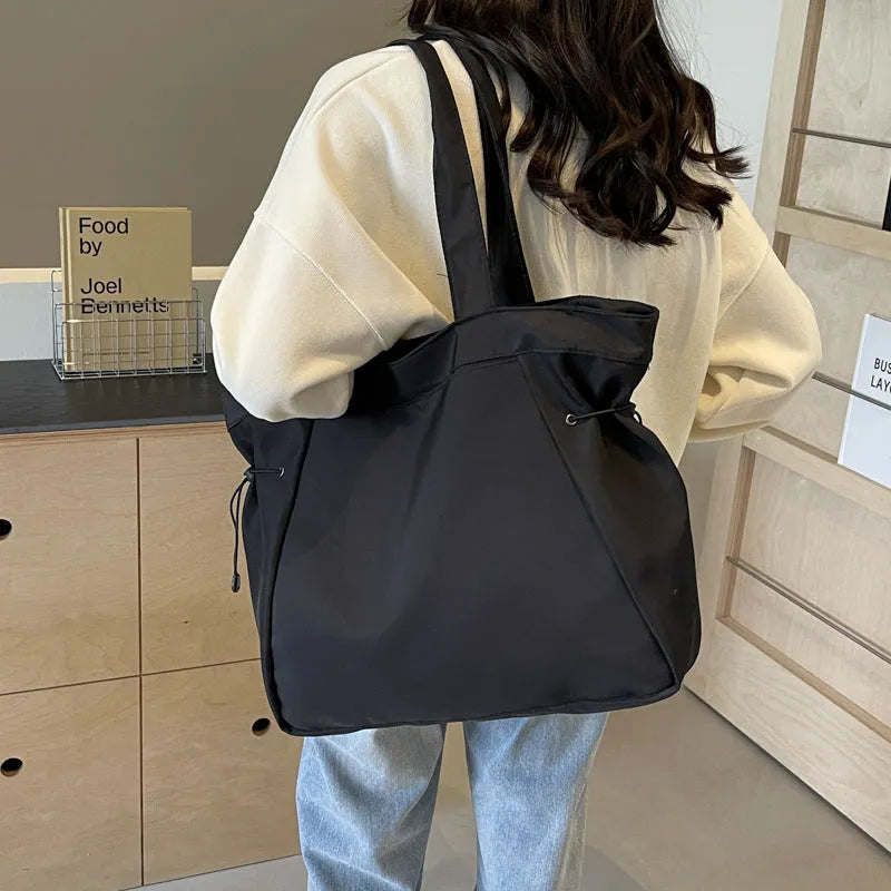 Soft Oxford cloth folding commuter tote bag in street style design showing colour options