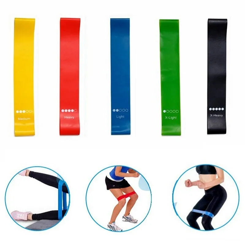 Five colour-coded TPE yoga tension straps with graduated thickness for resistance training