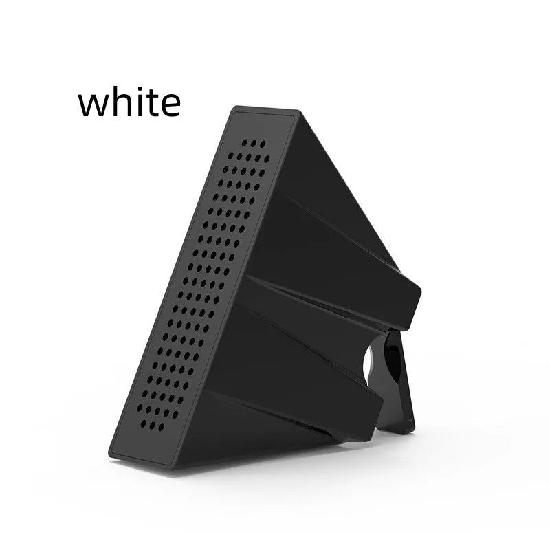 Portable Apple-compatible phone amplifier bracket in multiple colours on desktop