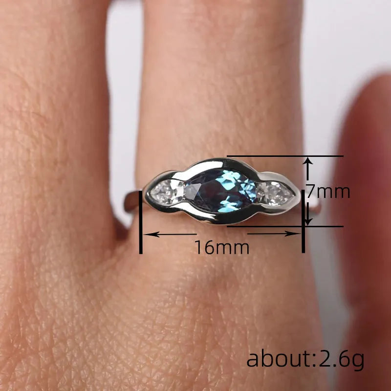 Women's geometric ellipse ring with zircon inlaid detailing in white gold colour