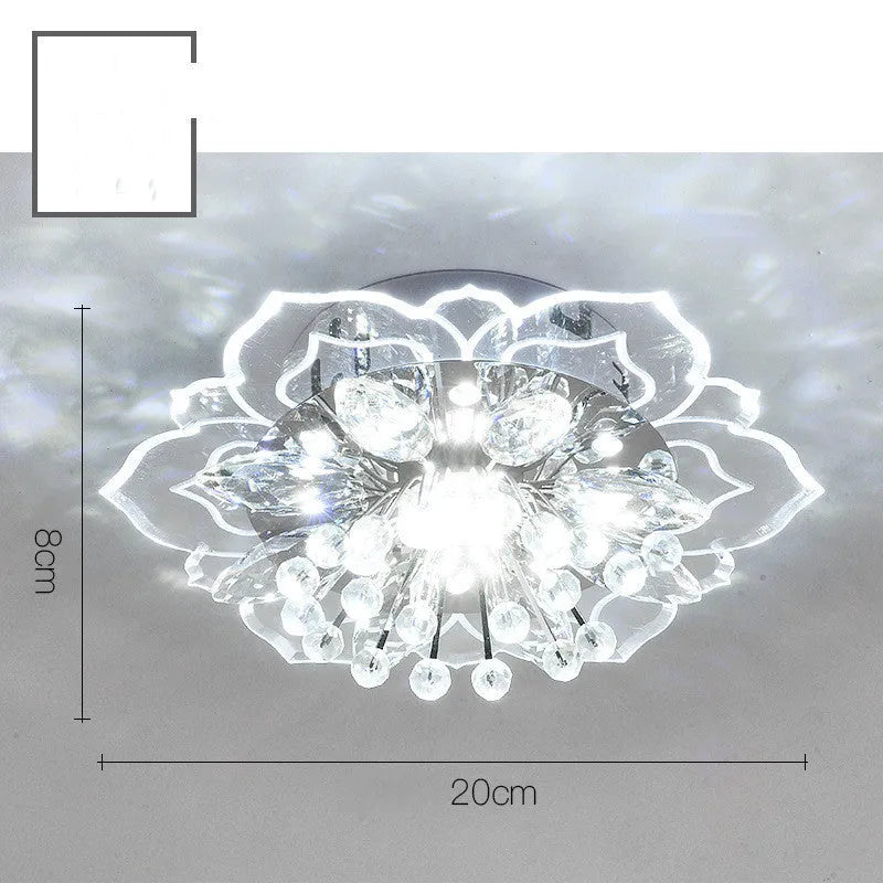 Small modern crystal ceiling lamp with flower-shaped shade in crystal, acrylic, and stainless steel materials