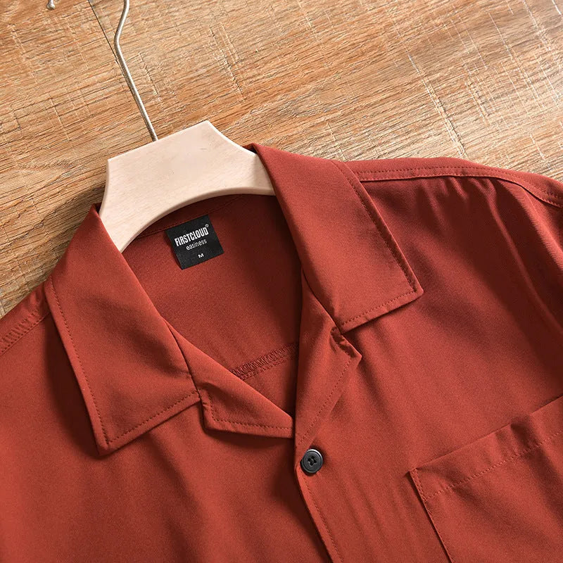 Men's loose fit short sleeve shirt in polyester cotton fabric, shown in army green colour