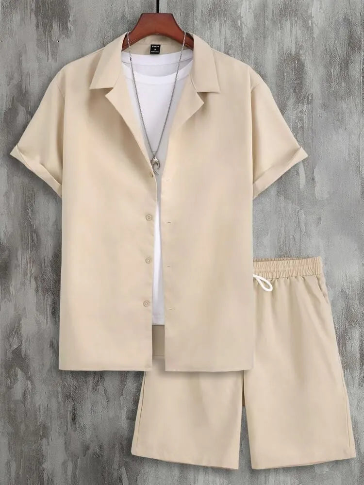Man wearing a white short sleeve Cuban collar sport jacket with matching shorts.