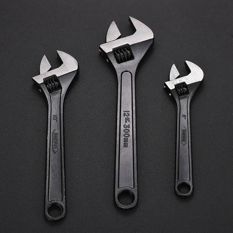 High-carbon steel open-end adjustable wrench with black finish on ergonomic handle.