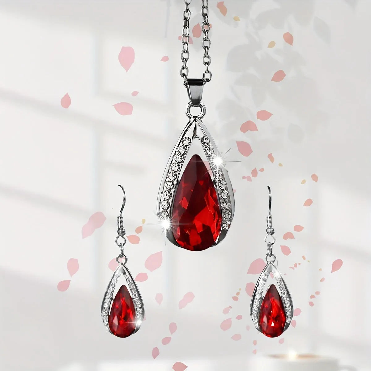 Teardrop pendant necklace and matching earrings set in black and red alloy jewellery