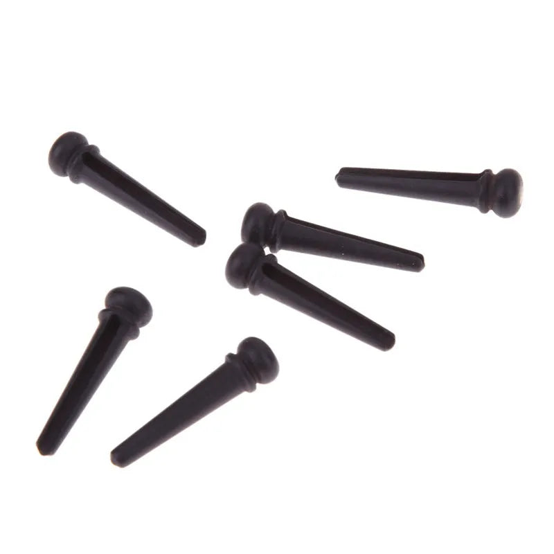 Six matt black ebony guitar string nails with 5.3mm bayonet diameter for folk acoustic guitars