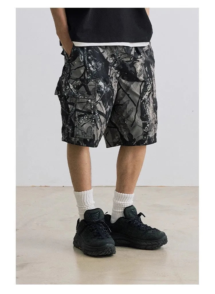 Straight-leg denim shorts in black or army green with mid-waist design and zip fly
