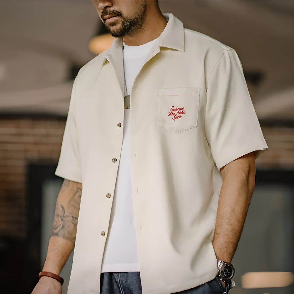 Men's light apricot Cuban collar shirt with bamboo and floral pattern detail