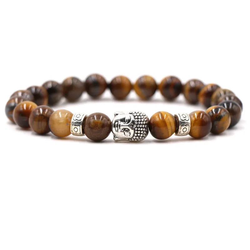 Natural stone stretch bracelet with tigereye, volcanic rock and turquoise beads on wrist