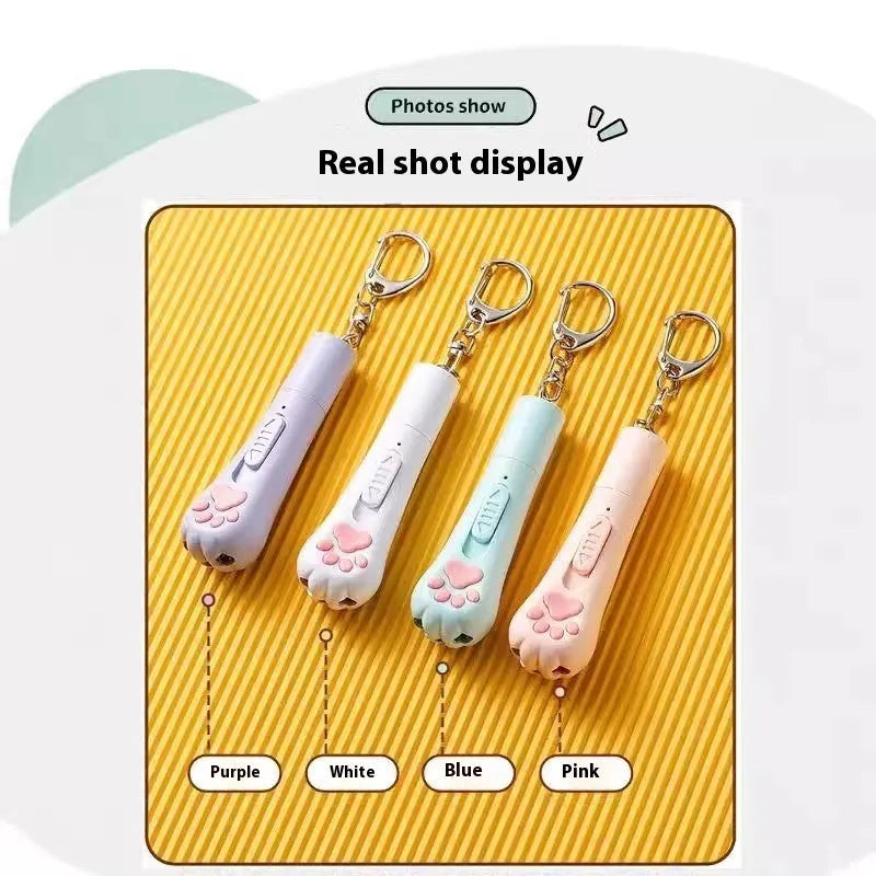 Rechargeable cat pen light toy with feather attachment in cream white, pink, or blue