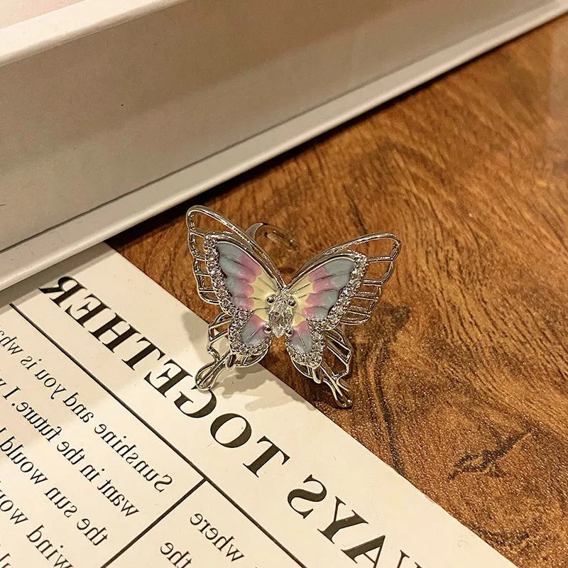 Women's copper butterfly ring with dripping oil finish and adjustable open loop design