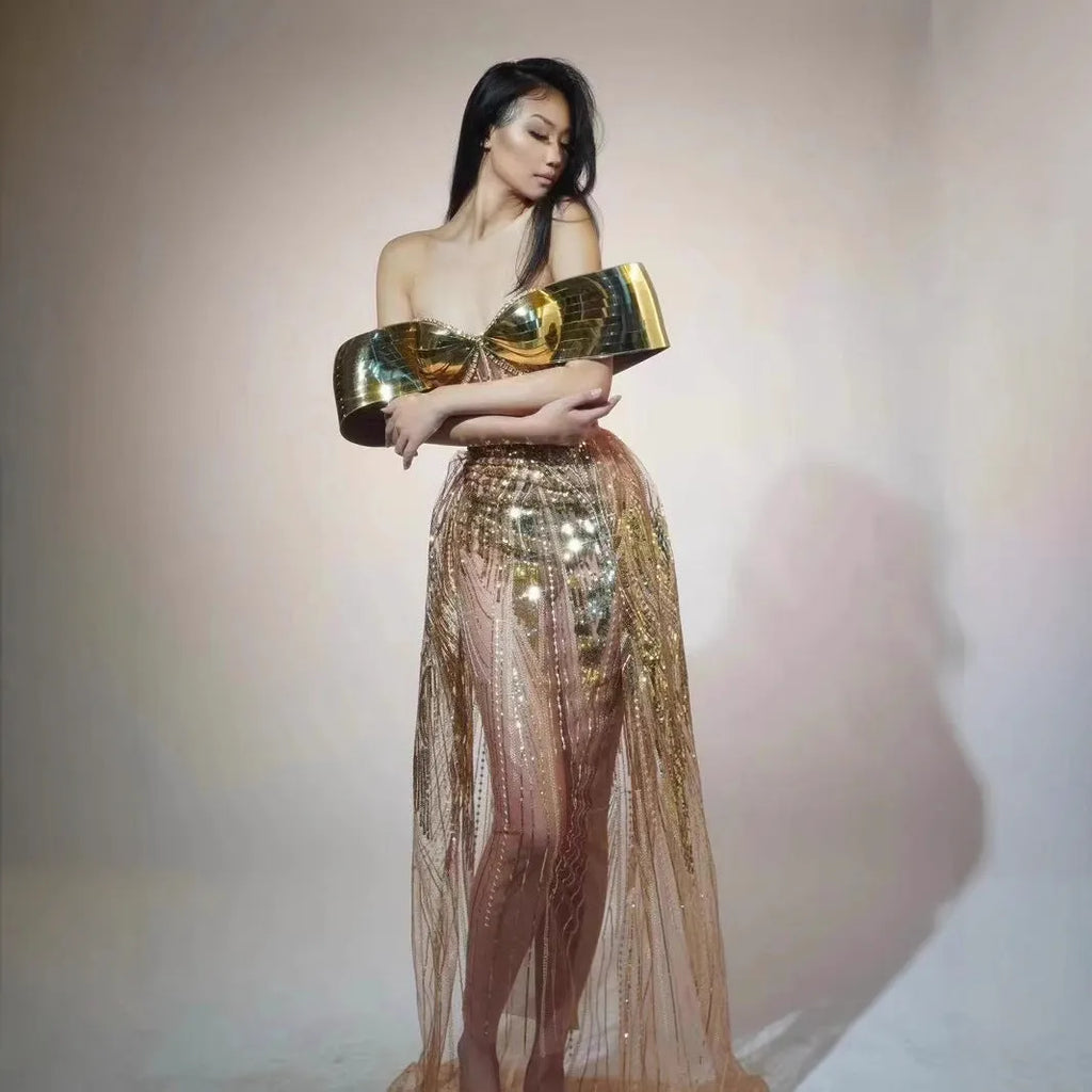 Gold sequined strapless evening dress with high-leg split and tulle underlay