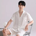 Men's ice silk pajama set in a blue houndstooth pattern, showing cardigan top and shorts.