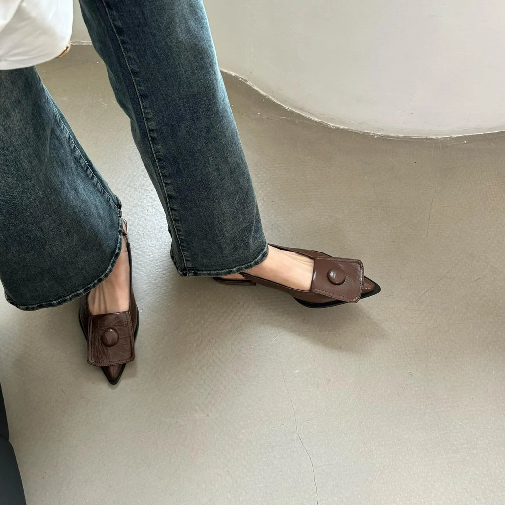 Women's pointed toe low heel sandals with back strap in apricot colour.