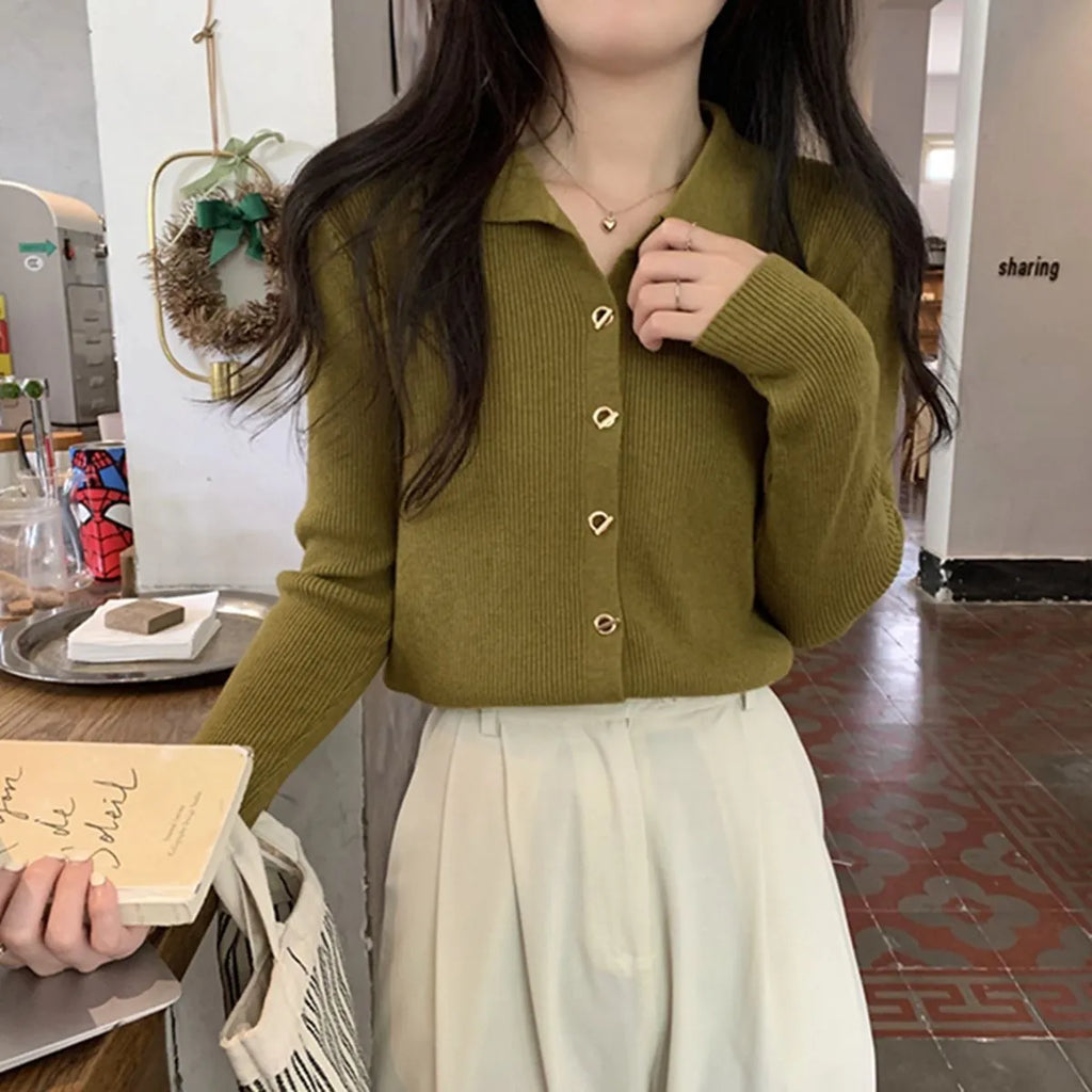 Long sleeved loose fit knitted cardigan top in viscose fibre, shown in beige colour.