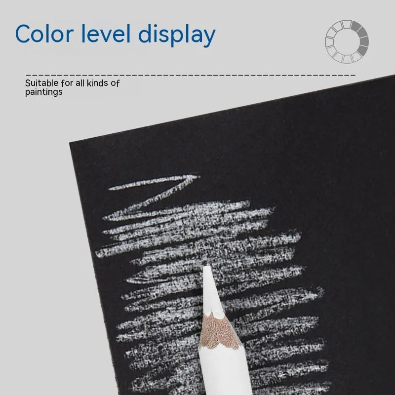 Three white charcoal sketching pencils with wooden barrels for highlighting on dark paper