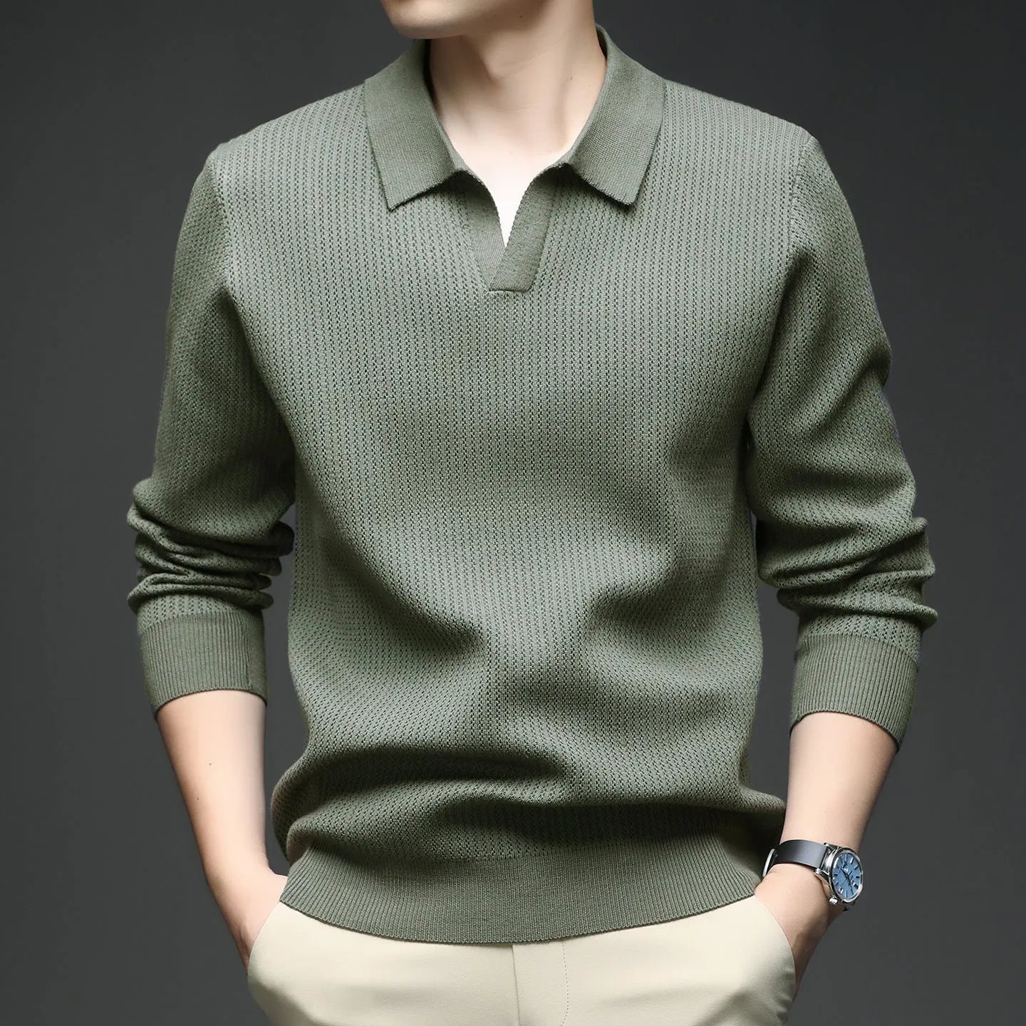Men's loose fit pullover sweater in green colour shown on model for autumn casual wear