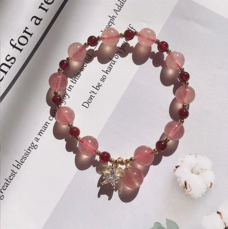 Handmade strawberry quartz crystal bracelet with Hetian jade peach blossom design showing five style variations