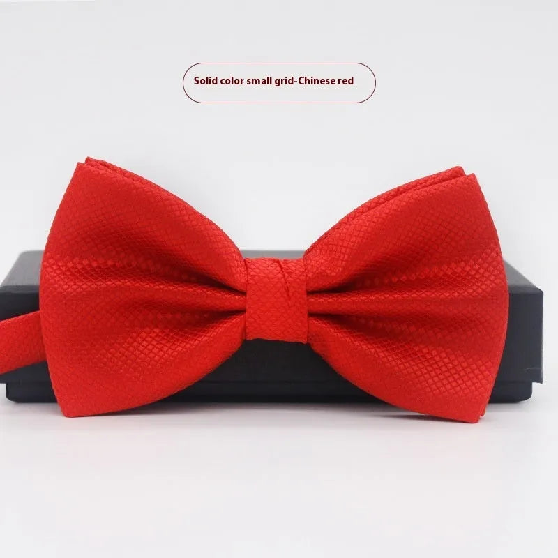 Men's flat head solid colour bow tie in polyester, showing 12cm by 6cm size on a background.