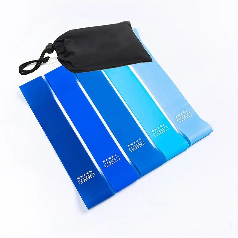 Five colour-coded TPE yoga tension straps with graduated thickness for resistance training
