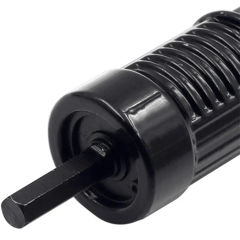 Black metal electric drill rivet gun with handle, wrench, and multiple rivet heads for industrial applications