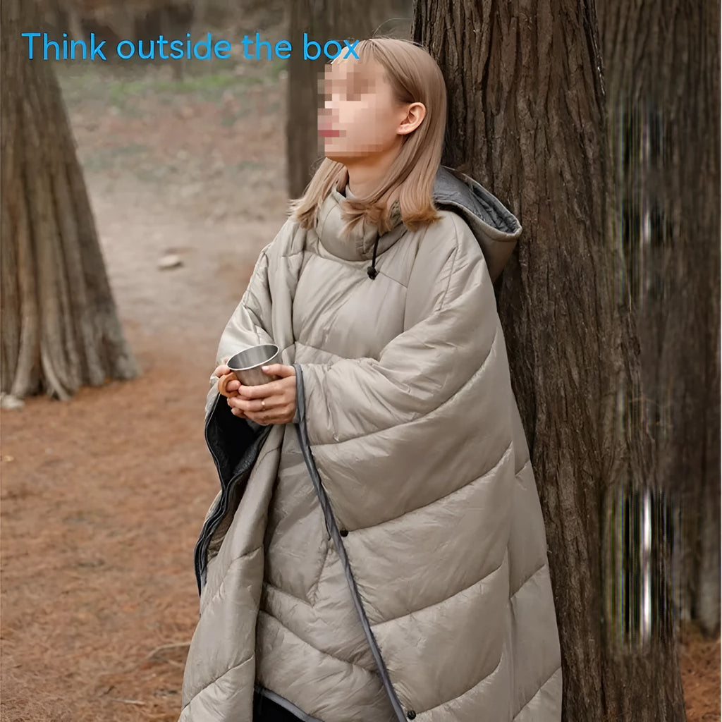 Army green outdoor cloak sleeping bag laid flat showing its 200x140cm size and wearable hood design.