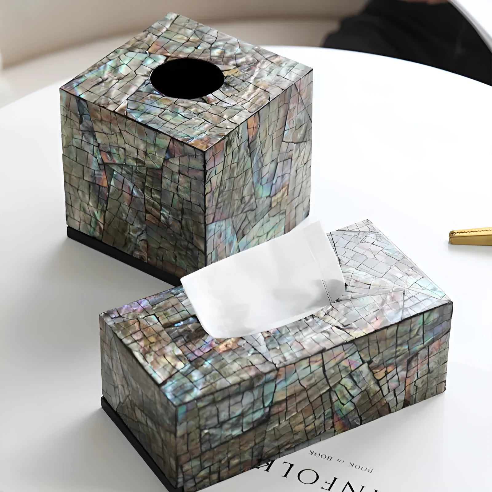 Black rectangular and square natural shell tissue box holder with removable storage tray.