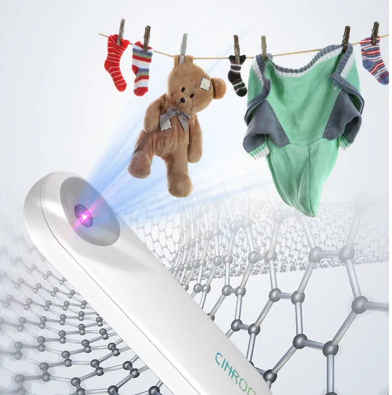 White portable UV sterilizer lamp for disinfecting mobile phones and small items.