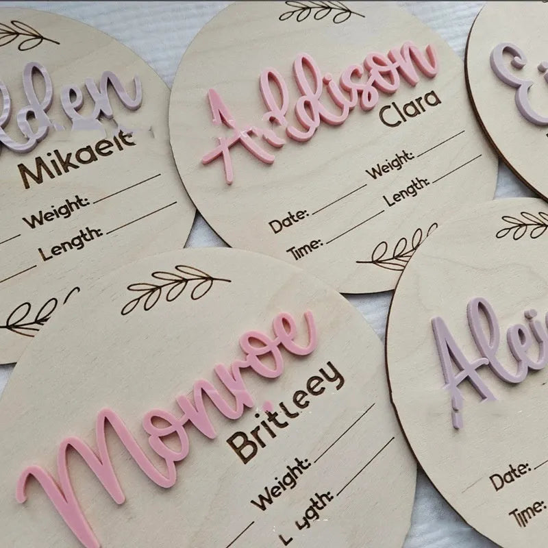 Square wooden baby name plaque showing newborn birth information, 15cm on each side.